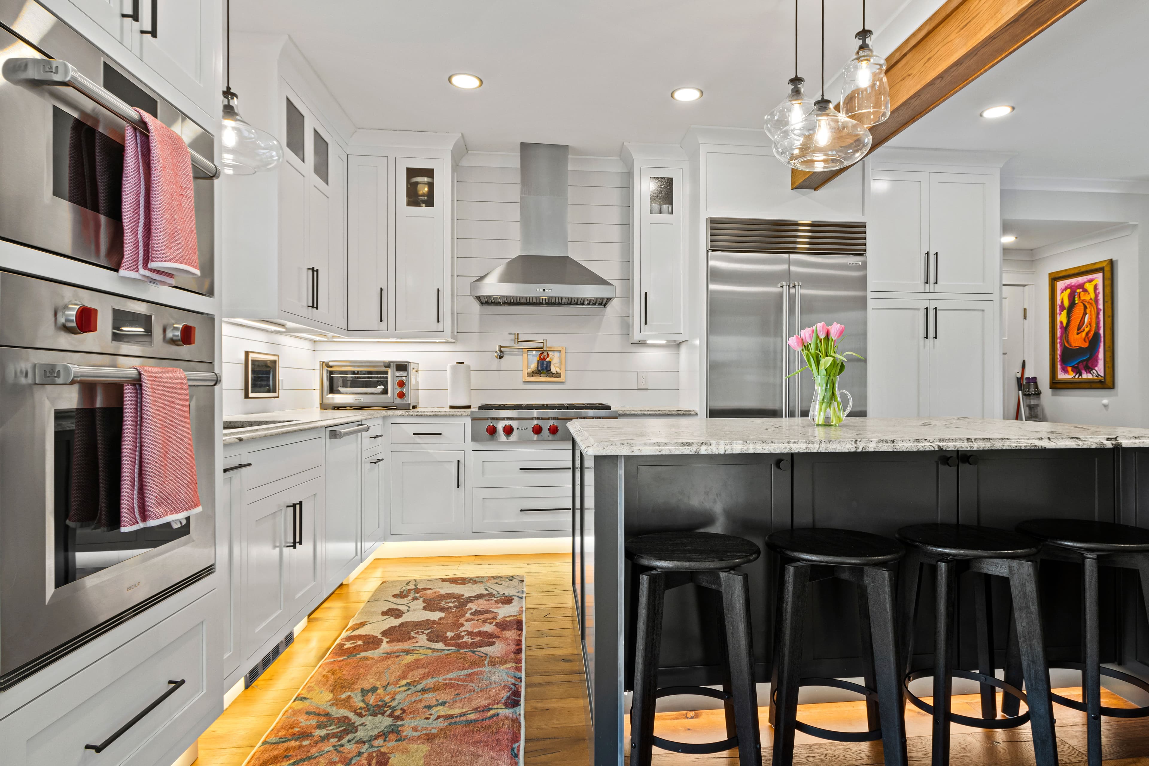 Modern custom kitchen with a mix of prefabricated and custom cabinetry.